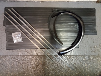 Sill Mat with Sill Edge Seals and Metal Inserts